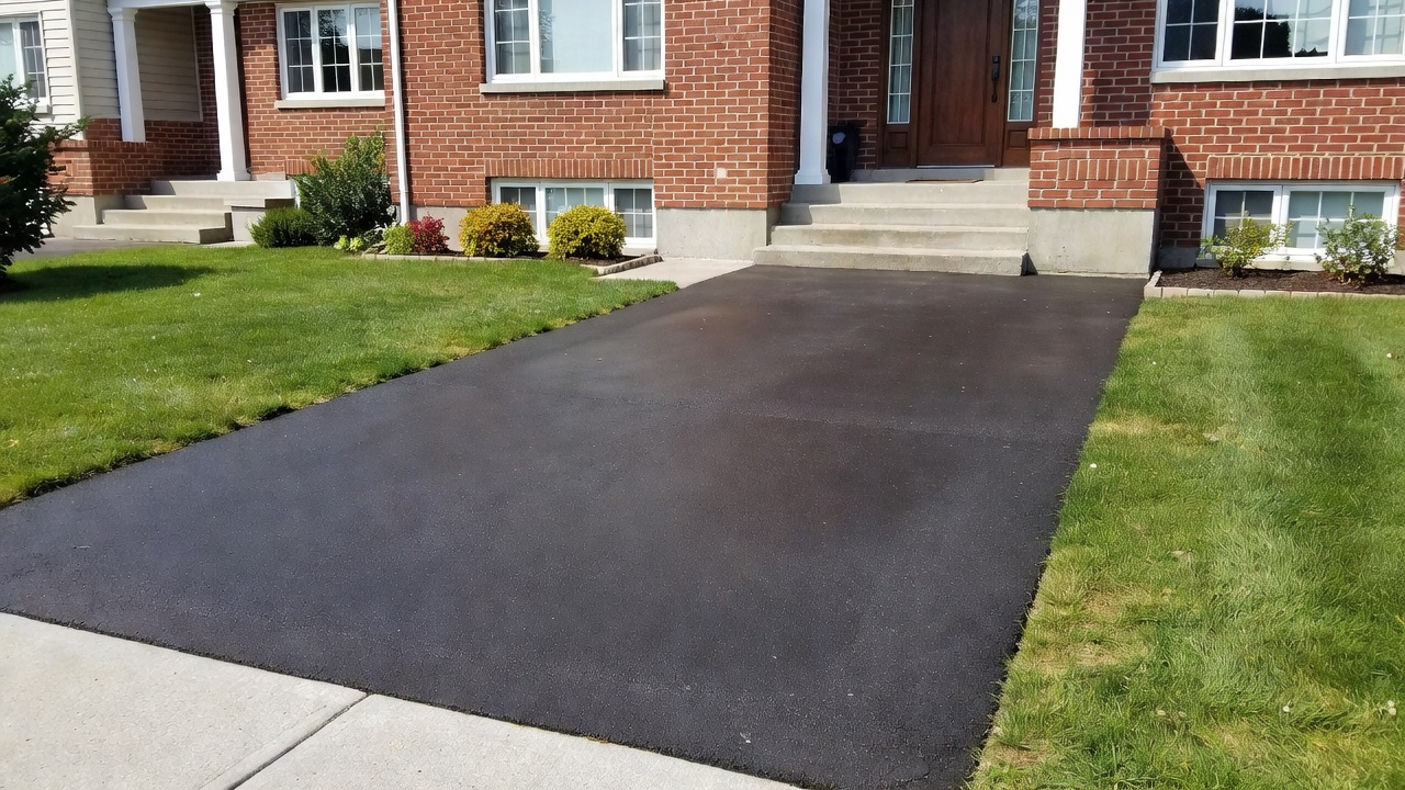 Sealed townhouse driveway after exterior cleaning in Toronto