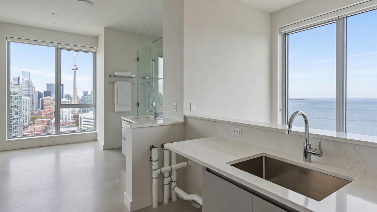 GTA plumbing professional inspecting condo water pipes in summer
